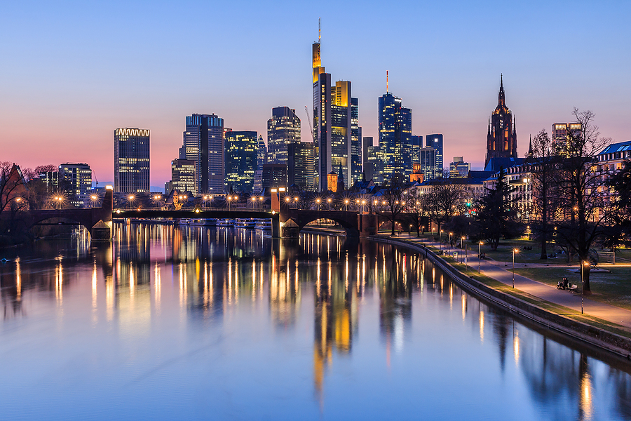 Frankfurt City Skyline In The Evening After Sunset. Illuminated