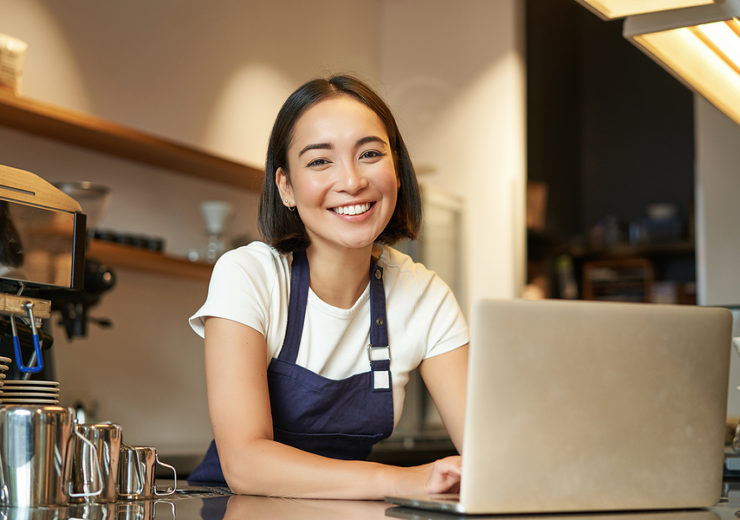 Enthusiastic Asian Girl In Cafe Uniform, Barista Worker With Lap